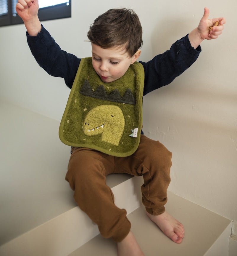 Babero grande rizo Dino Trixie - Nanetes